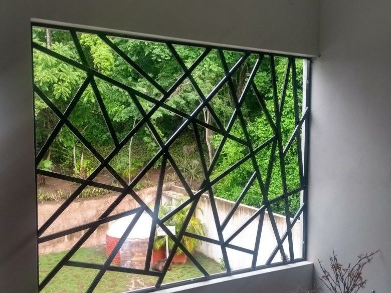Geometric window security grille by The Classic Forge