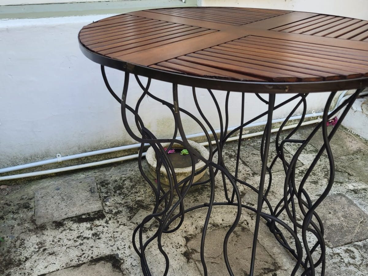 Wrought iron bistro table by The Classic Forge
