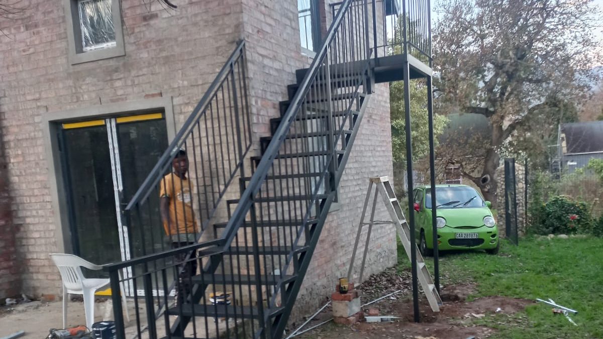 Custom steel gate fabricated by The Classic Forge — homepage hero photograph